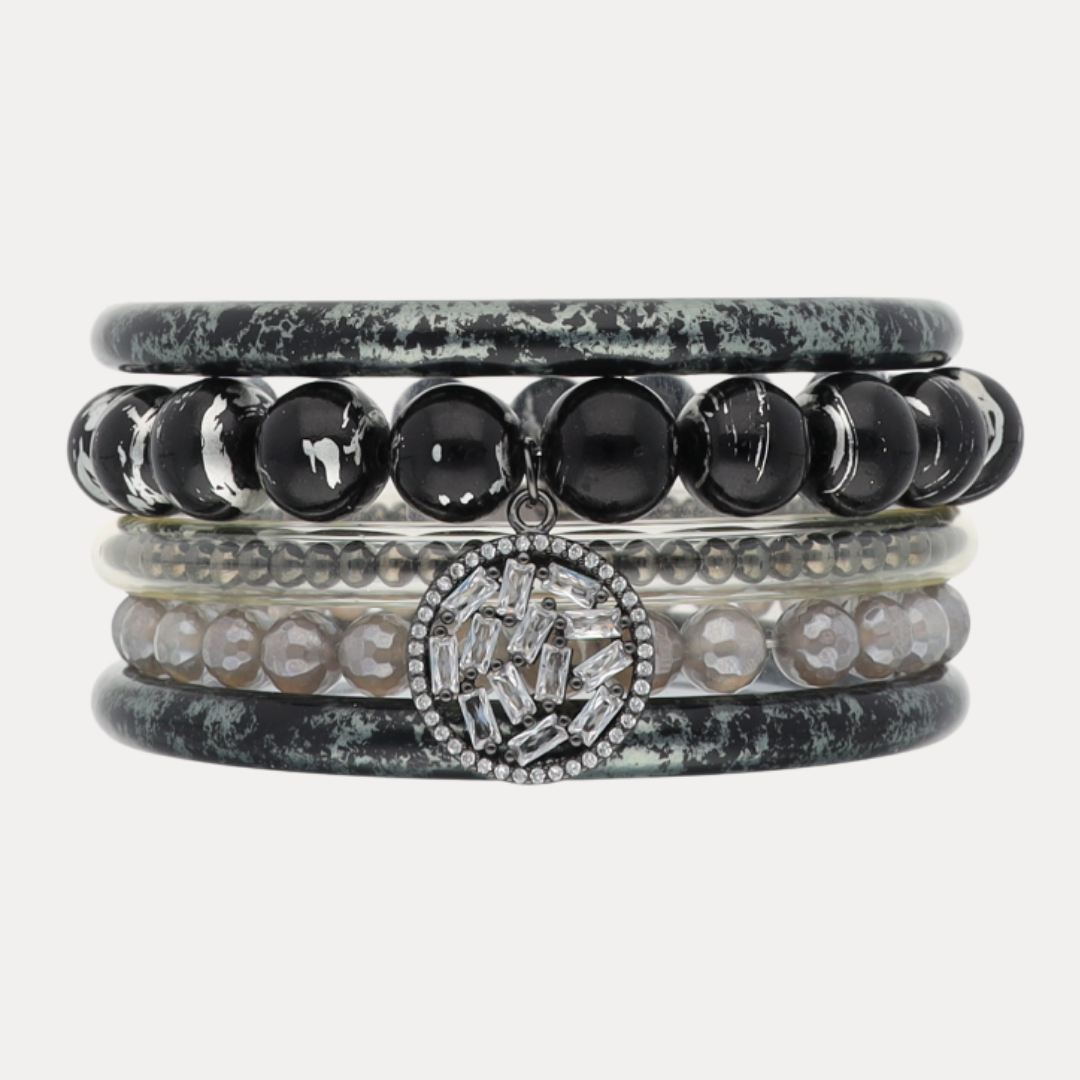 a stack of bracelets with beads