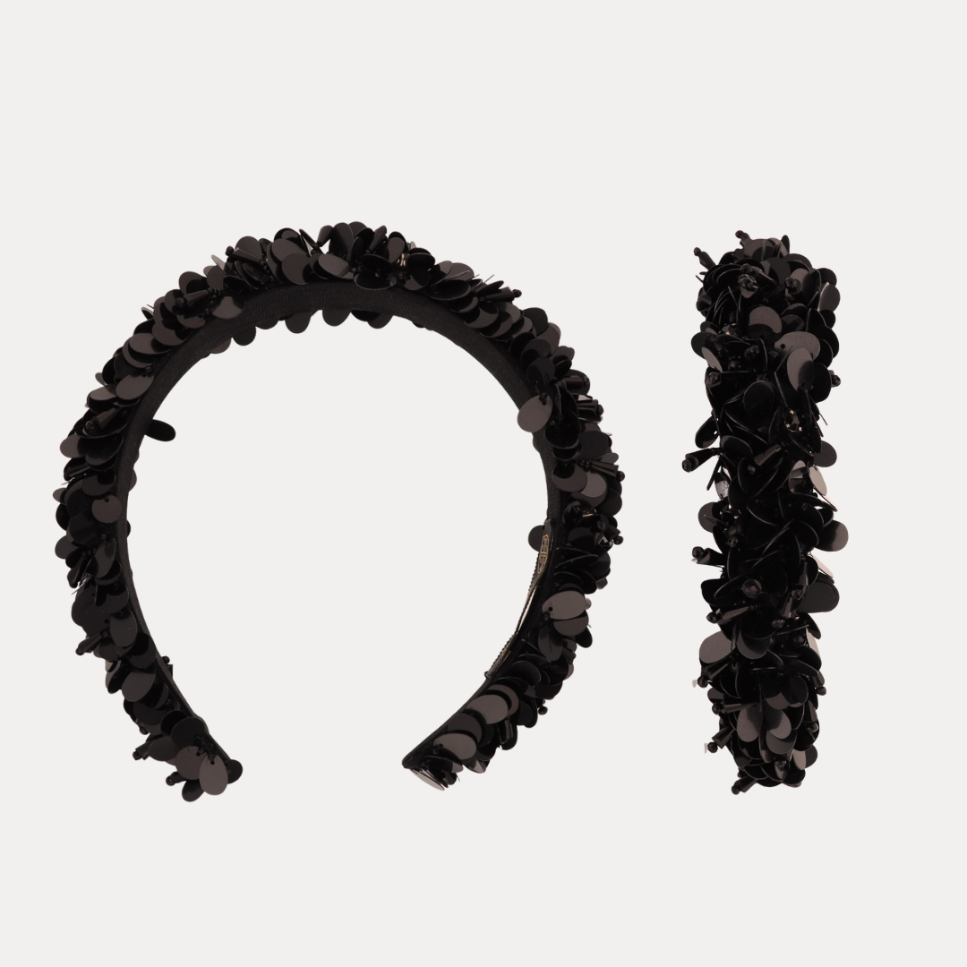 a headband and bracelet with sequins