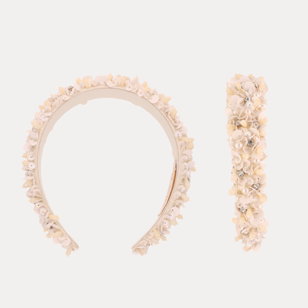 a headband and bracelet with flowers