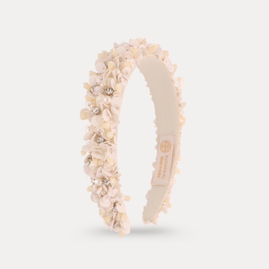 a headband with flowers and diamonds