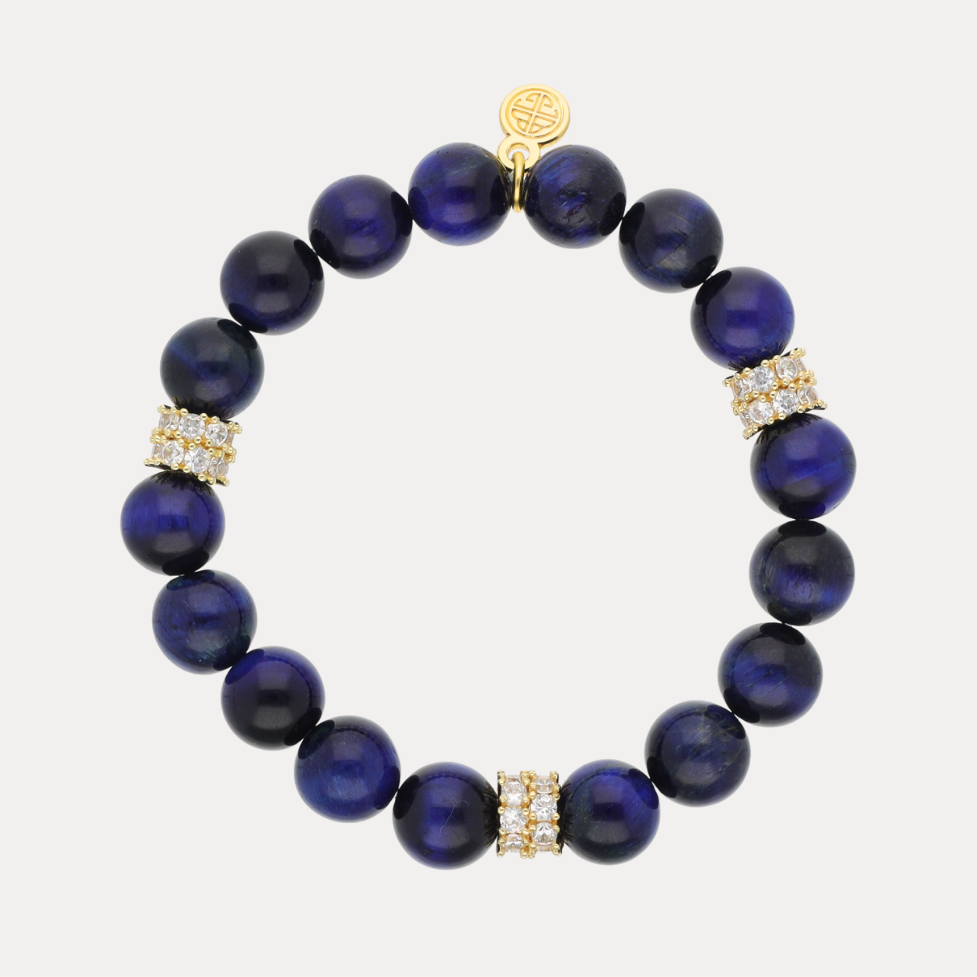 Cosmos Bracelet featuring deep midnight-blue beaded stones and pavé-encrusted spacer rings, handcrafted elegance.