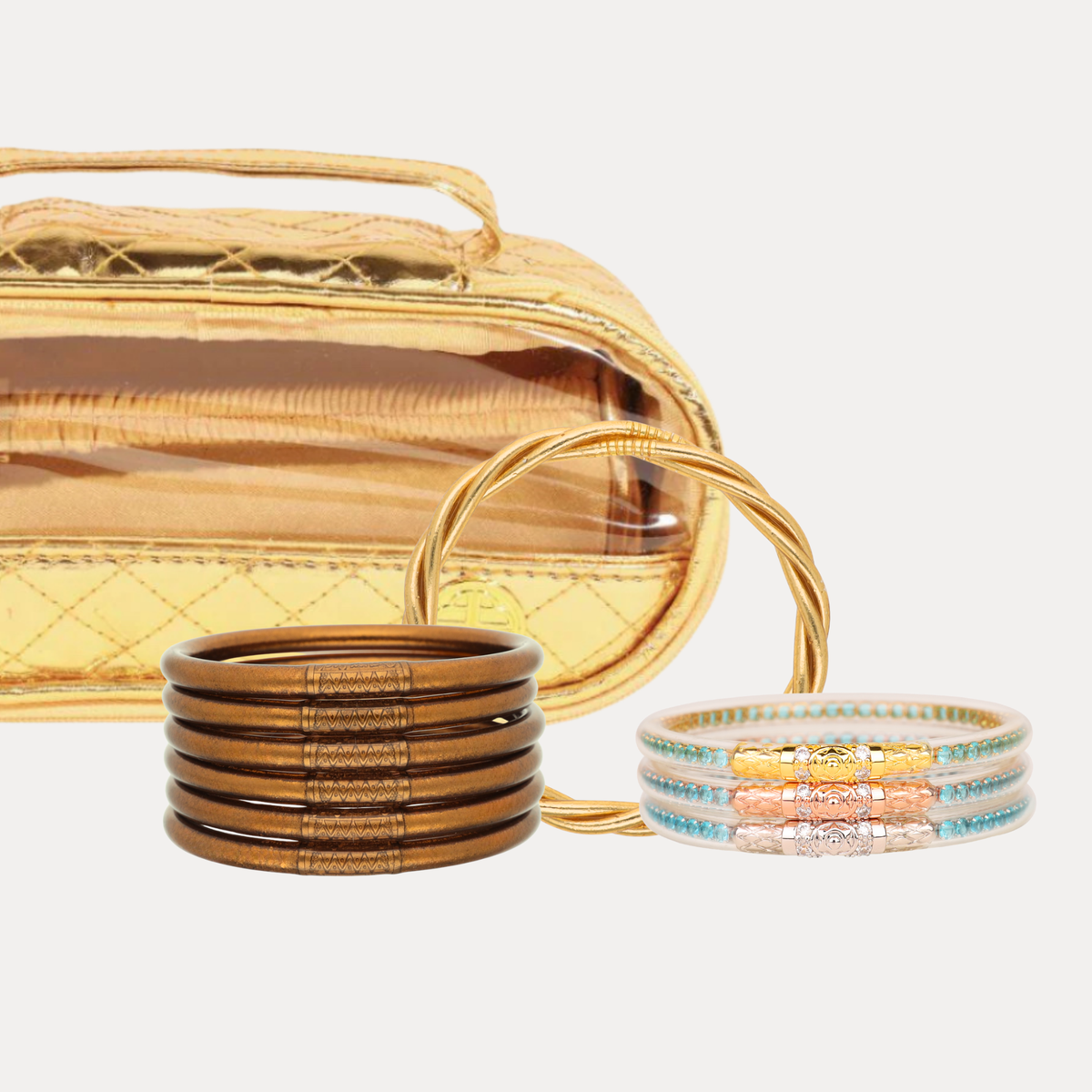 a gold bag with several bracelets