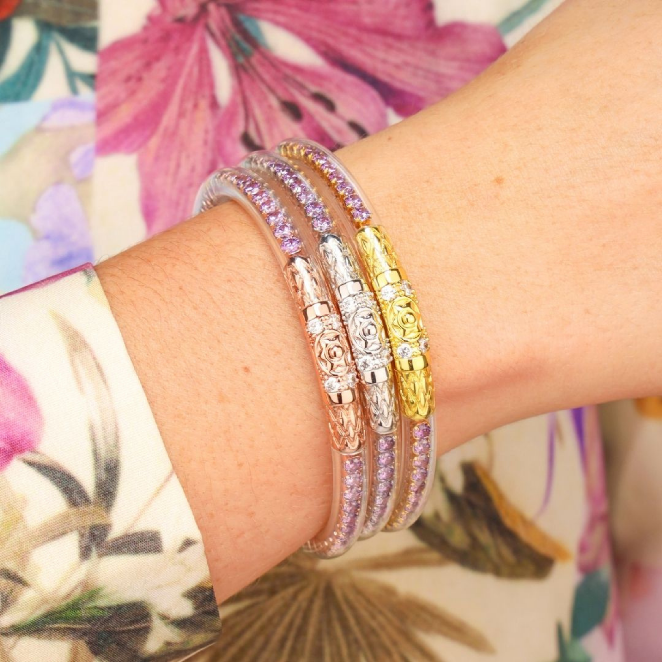 a close up of a bracelet on a person's wrist