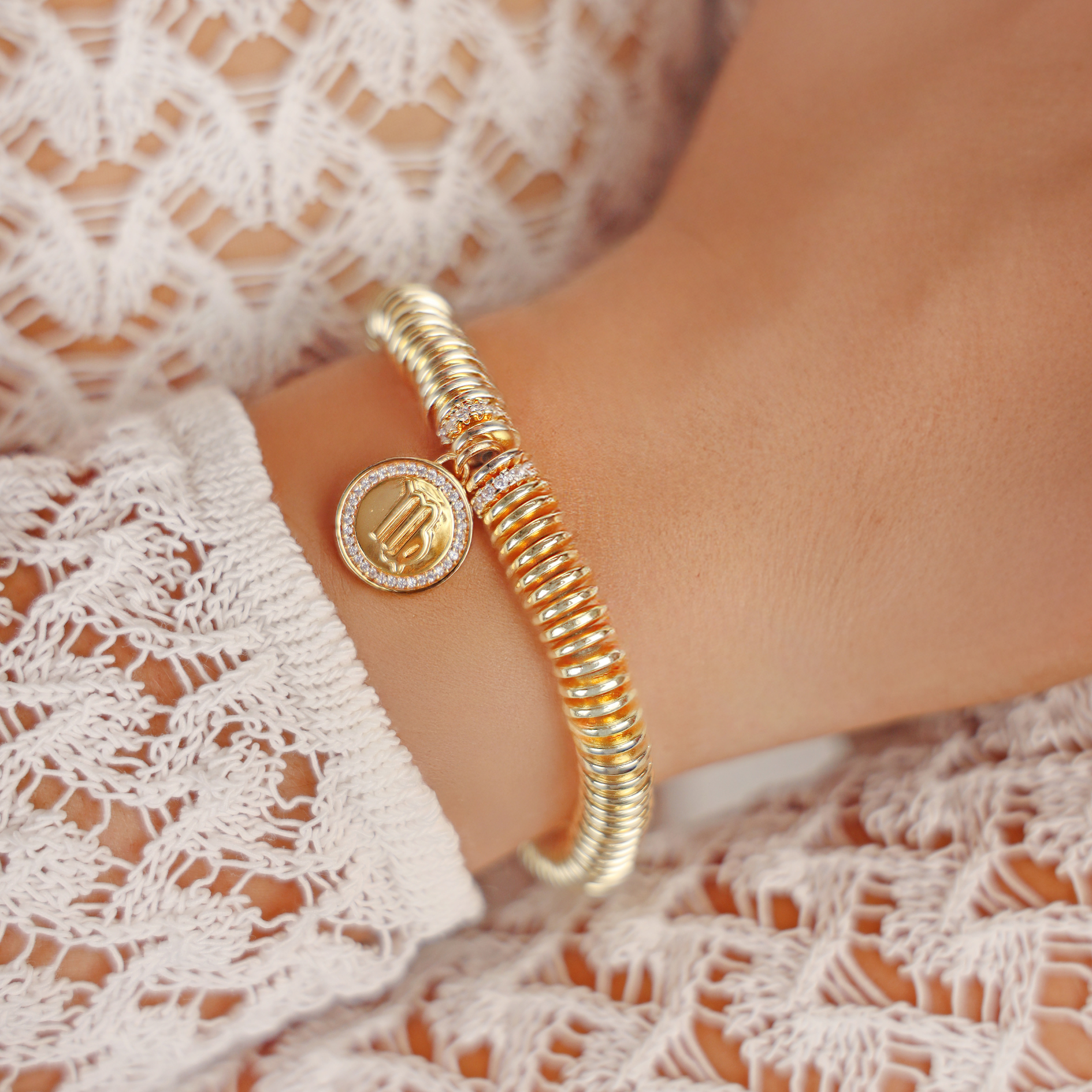 a close up of a bracelet on a wrist