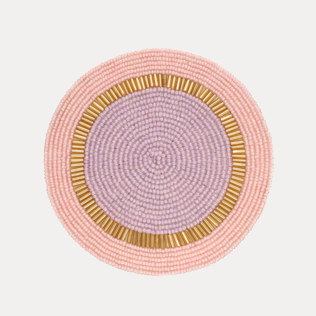 a close up of a beaded coaster