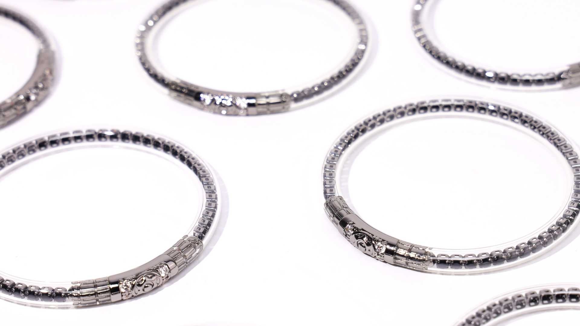 Black Spinel Three Queens All Weather Bangle for women.