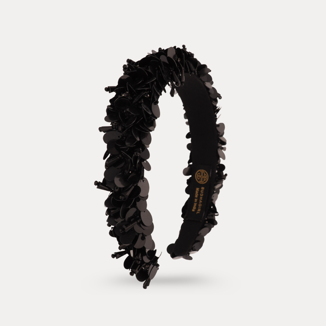 a headband with black sequins