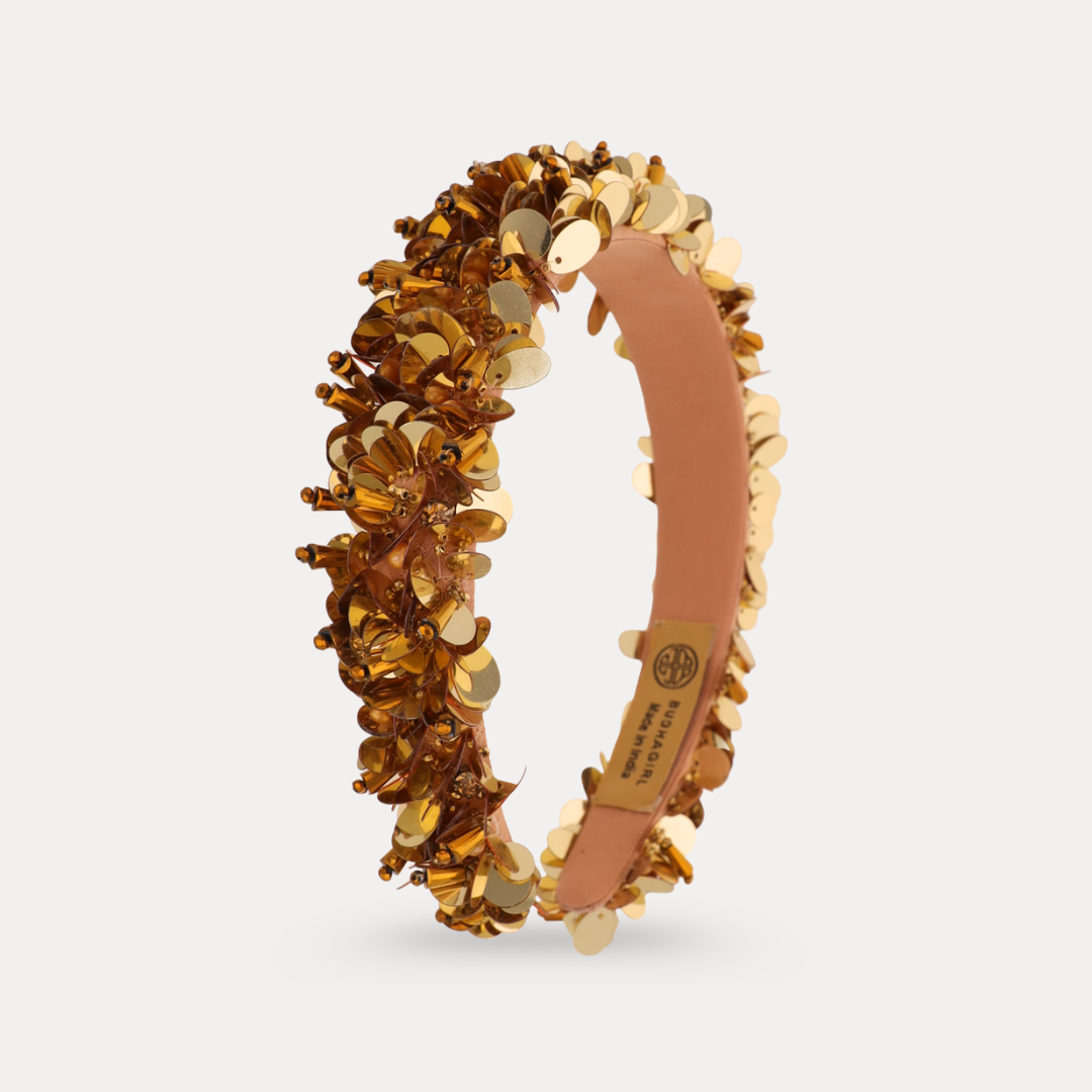 a headband with sequins on it