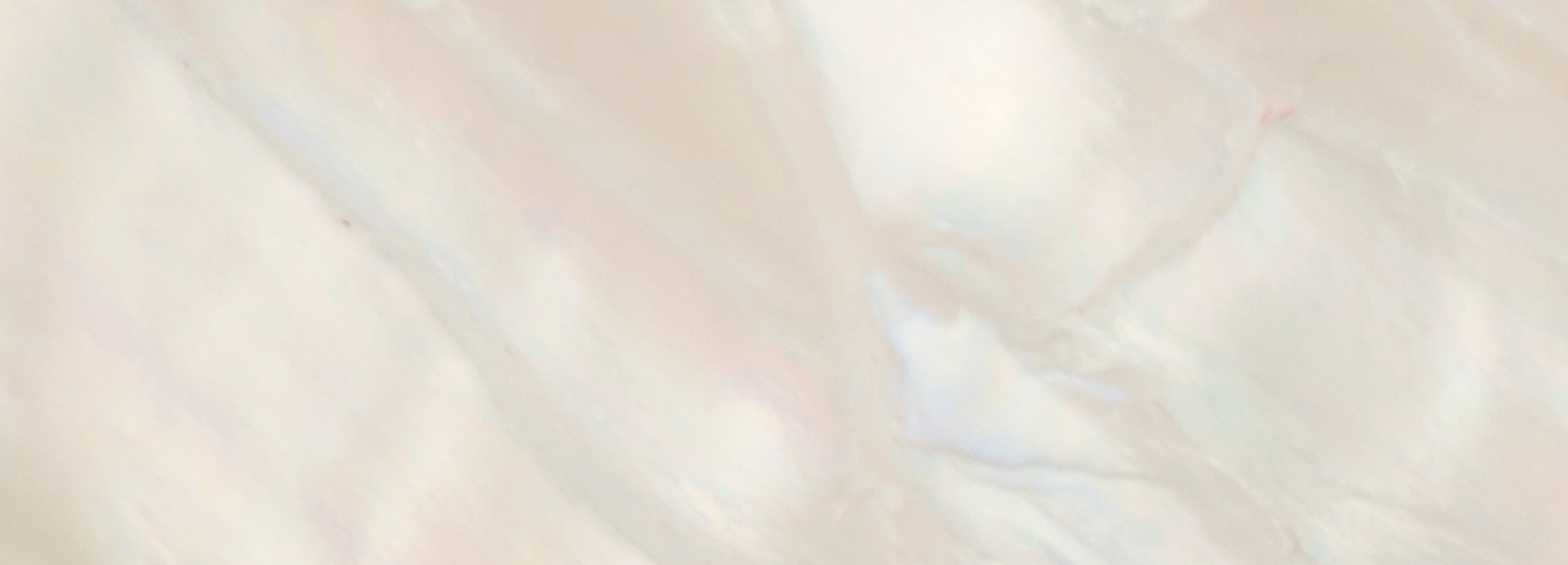 Gradient background transitioning from light beige to white