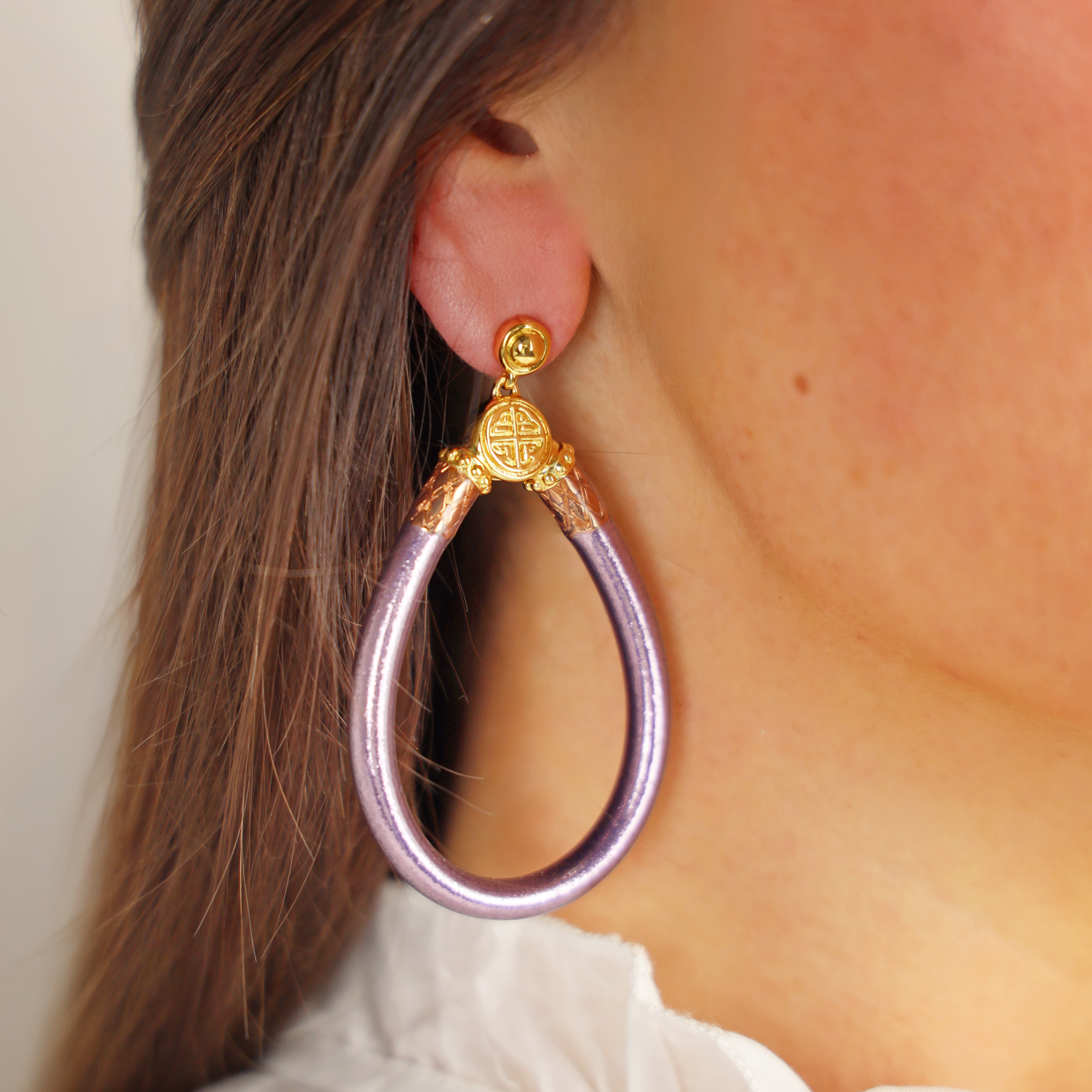 a close up of a woman's ear