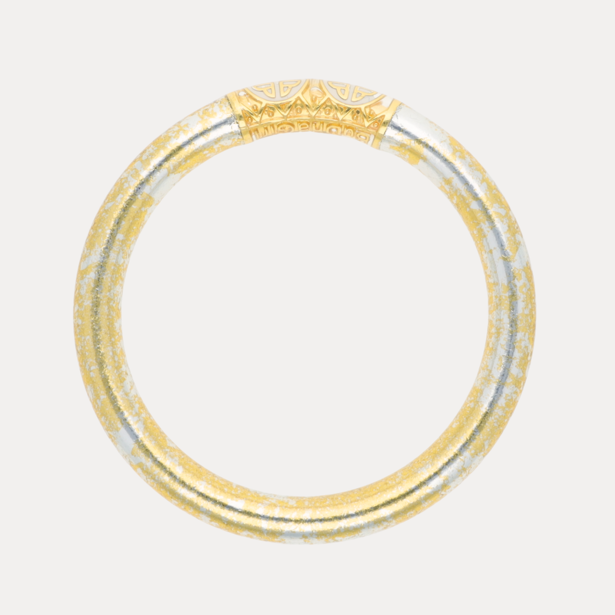 BuDhaGirl two tone gold and silver bangle bracelet for women with an ornate geometric pattern and luminous finish shown against a neutral background