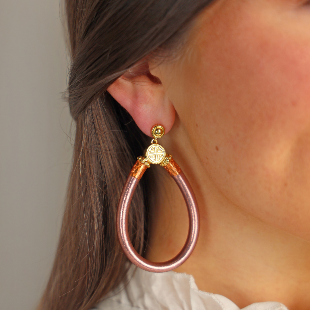 a close up of a woman's ear