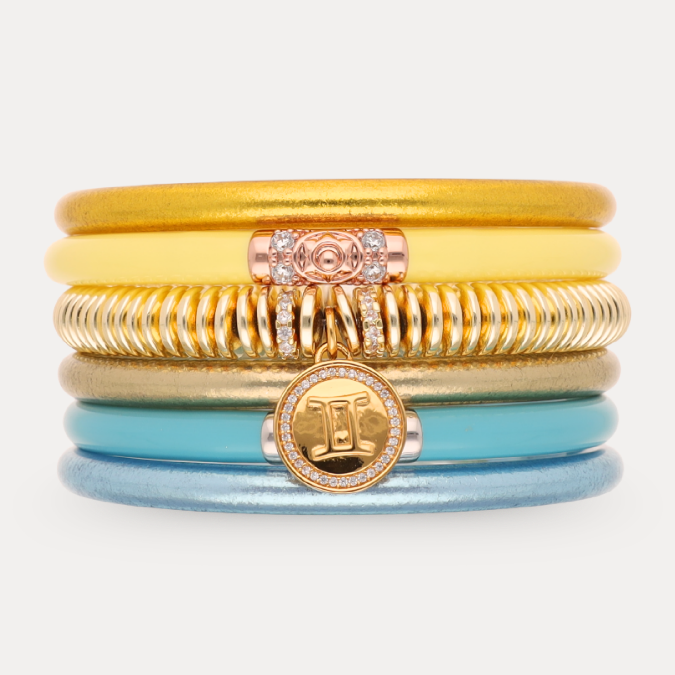 a stack of colorful bracelets