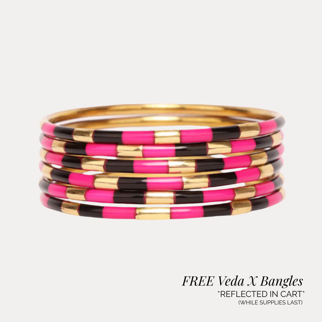 a stack of pink and black bracelets